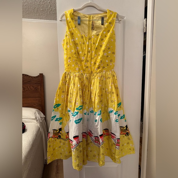 Pinup Couture Dresses & Skirts - Pinup Couture Yellow Floral Dress